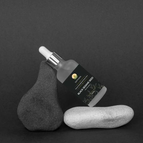 Black Sesame Seed Hair Essential — 30 ml Ayurvedic hair oil bottle